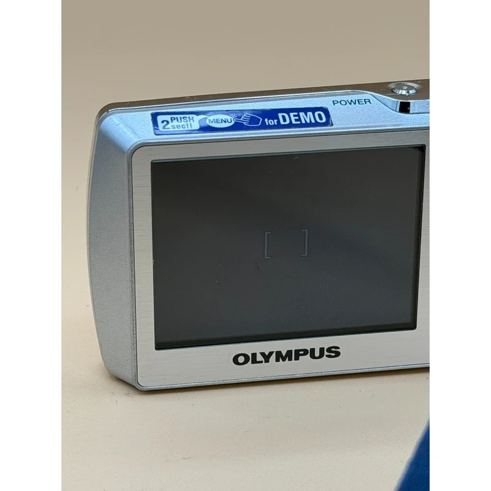 Olympus Stylus 760 7.1MP Digital Camera Silver Tested w/ Charger 1GB xD
